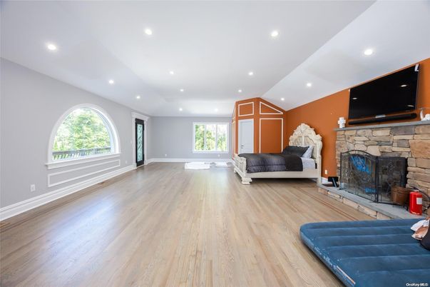 Bedroom, Fireplace, Interior, Recessed Lighting, Wood Texture Flooring