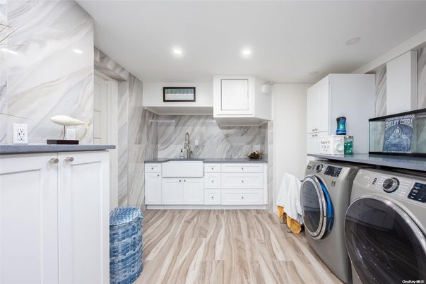 Interior, Marble Walls, Recessed Lighting, Utility Closets, Washer, Wood Texture Flooring