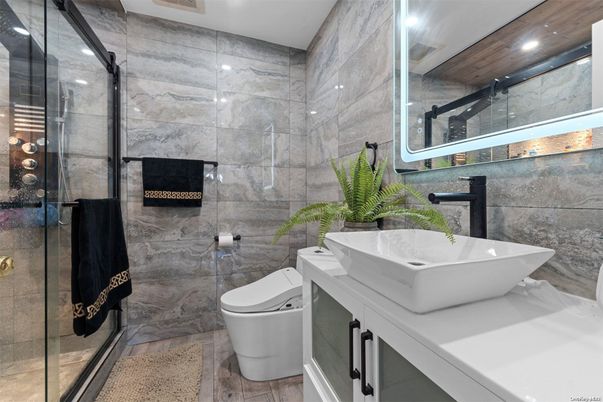 Bathroom, Free Standing Baths, Glass Shower, Interior, Marble Walls, Recessed Lighting