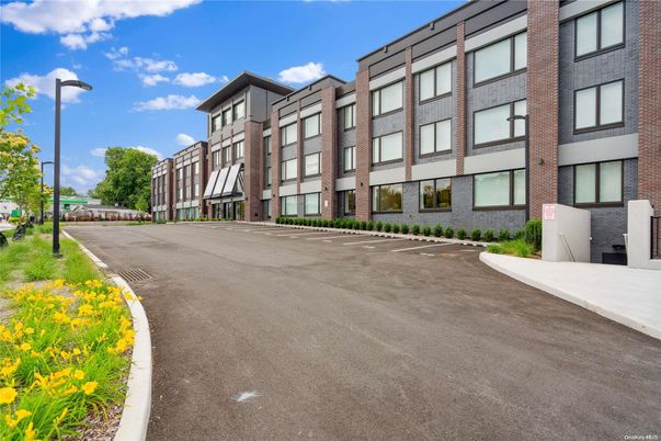 Exterior, Facade, Brick Facade, Condo Building
