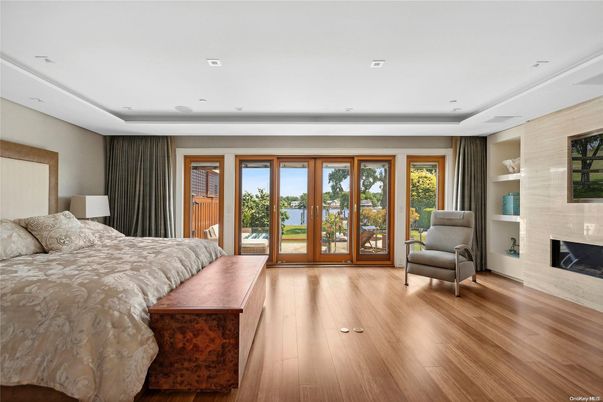 Bedroom, Fireplace, Interior, Recessed Lighting, Wood Texture Flooring