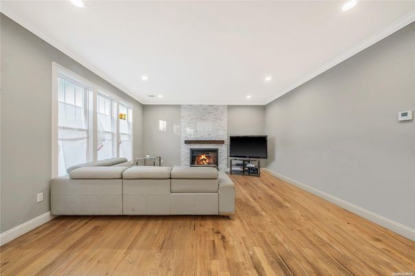 Fireplace, Interior, Living room, Recessed Lighting, Wood Texture Flooring