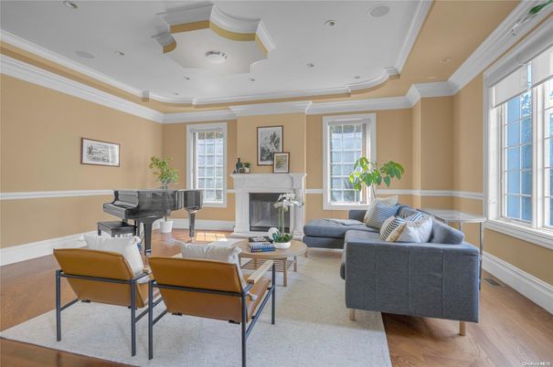 Fireplace, Interior, Living room, Piano, Recessed Lighting, Wood Texture Flooring