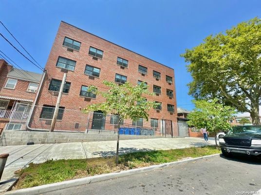 Exterior, Facade, Brick Facade, Condo Building