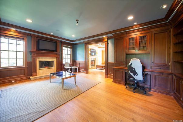 Fireplace, Home Office, Interior, Recessed Lighting, Wood Texture Flooring, Wooden Walls