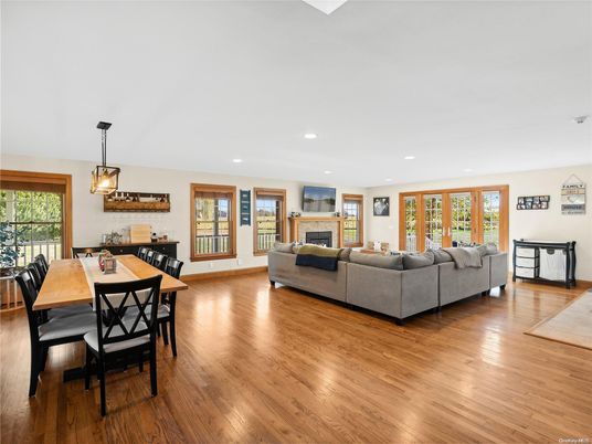 Dining room, Fireplace, Interior, Living room, Pendant Lights, Recessed Lighting, Wood Texture Flooring