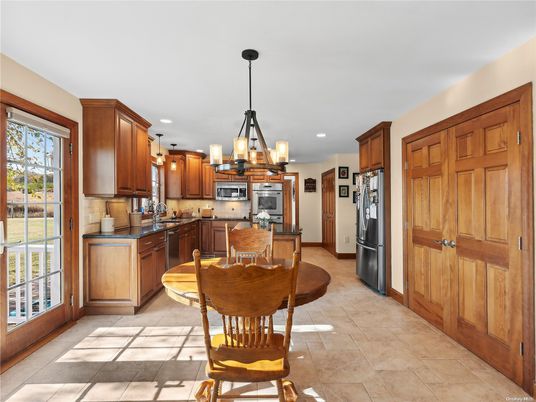 Chandelier, Dining room, Interior, Kitchen, Pendant Lights, Recessed Lighting, Stainless Steel Appliances