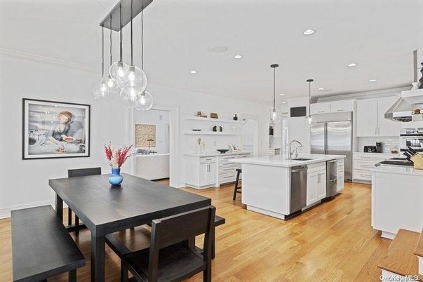Dining room, Interior, Kitchen, Pendant Lights, Recessed Lighting, Stainless Steel Appliances, Wood Texture Flooring