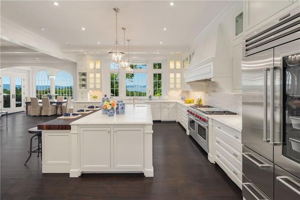 Chandelier, Interior, Kitchen, Living room, Pendant Lights, Recessed Lighting, Stainless Steel Appliances, Wood Texture Flooring