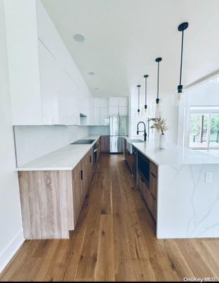 Interior, Kitchen, Marble Walls, Pendant Lights, Recessed Lighting, Wood Texture Flooring