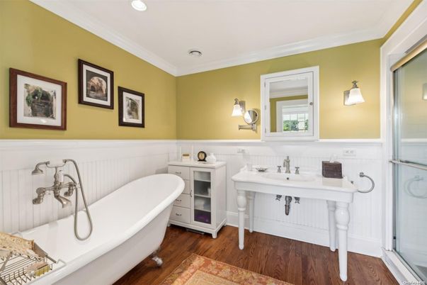 Bathroom, Dual Sink Vanities, Free Standing Baths, Interior, Recessed Lighting, Wood Texture Flooring