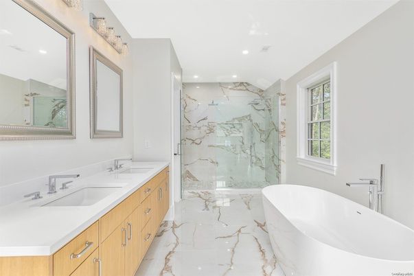 Bathroom, Dual Sink Vanities, Free Standing Baths, Glass Shower, Interior, Marble, Marble Walls, Recessed Lighting
