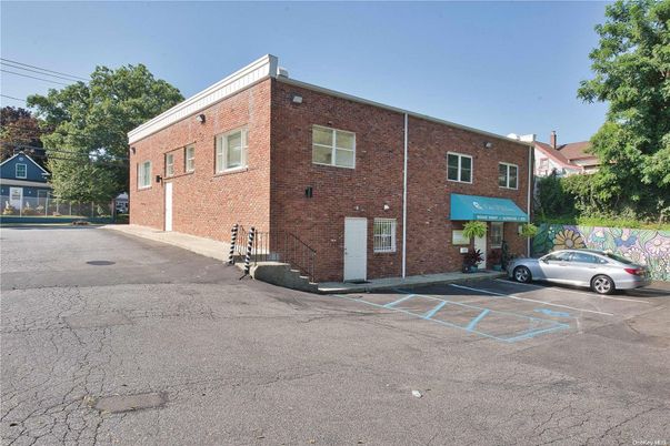 Exterior, Facade, Brick Facade, Condo Building