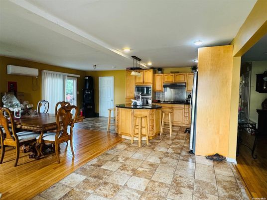 Dining room, Interior, Kitchen, Recessed Lighting, Stainless Steel Appliances, Wood Texture Flooring
