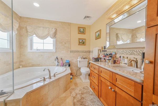 Bathroom, Dual Sink Vanities, Glass Shower, Interior, Recessed Lighting, Tile Countertops