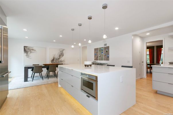 Dining room, Interior, Kitchen, Pendant Lights, Recessed Lighting, Stainless Steel Appliances, Wood Texture Flooring