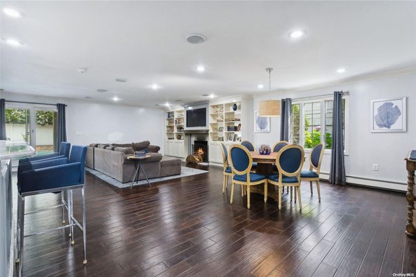 Dining room, Fireplace, Interior, Living room, Pendant Lights, Recessed Lighting, Wood Texture Flooring