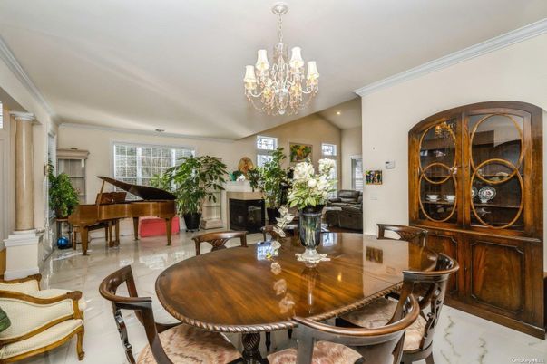 Chandelier, Dining room, Fireplace, Interior, Piano