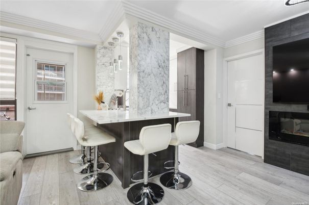 Fireplace, Interior, Marble Walls, Pendant Lights, Wood Texture Flooring