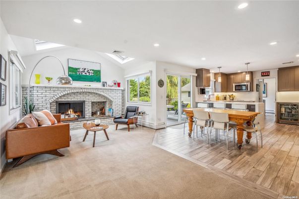 Dining room, Fireplace, Interior, Kitchen, Living room, Pendant Lights, Recessed Lighting, Stainless Steel Appliances, Wood Texture Flooring