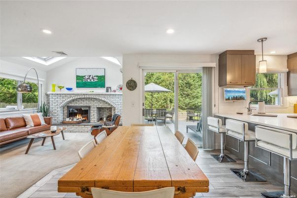 Dining room, Fireplace, Interior, Living room, Pendant Lights, Recessed Lighting, Wood Texture Flooring
