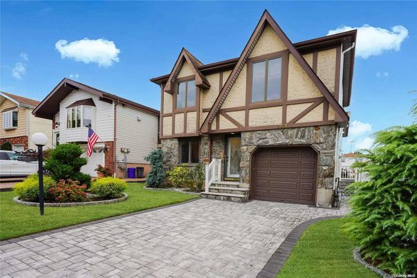 Attached, Exterior, Facade, Tudor Revival
