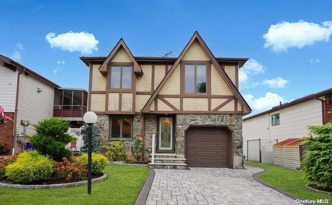 Attached, Exterior, Facade, Tudor Revival