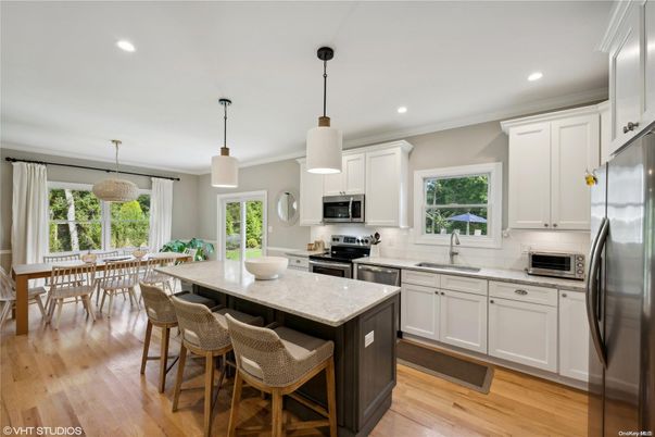 Dining room, Interior, Kitchen, Pendant Lights, Recessed Lighting, Stainless Steel Appliances, Wood Texture Flooring
