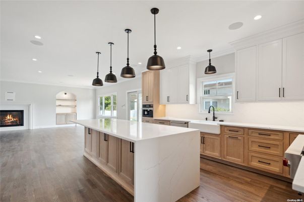 Fireplace, Interior, Kitchen, Pendant Lights, Recessed Lighting, Stainless Steel Appliances, Wood Texture Flooring