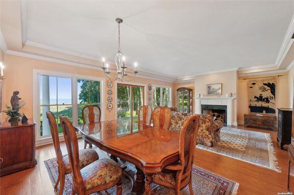 Chandelier, Dining room, Fireplace, Interior, Wood Texture Flooring