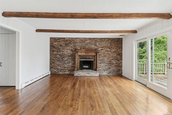 Empty room, Fireplace, Interior, Stone Walls, Wooden Beams, Wood Texture Flooring
