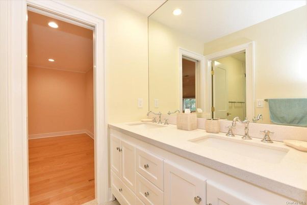 Bathroom, Dual Sink Vanities, Interior, Recessed Lighting, Wood Texture Flooring