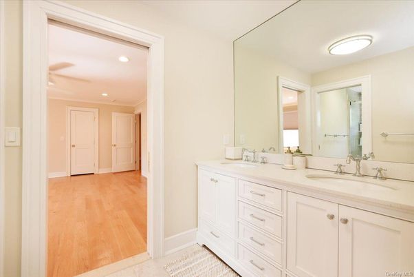 Bathroom, Dual Sink Vanities, Interior, Recessed Lighting, Wood Texture Flooring