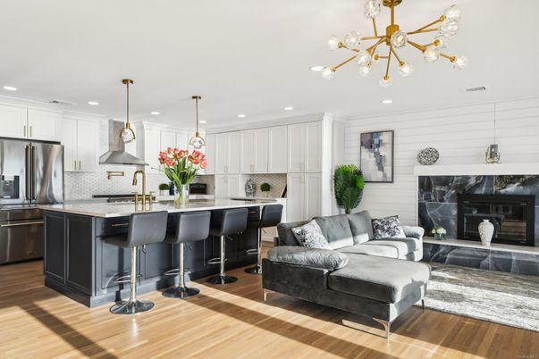 Fireplace, Interior, Kitchen, Pendant Lights, Recessed Lighting, Stainless Steel Appliances, Wood Texture Flooring