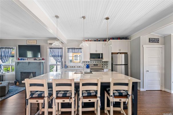 Fireplace, Interior, Kitchen, Pendant Lights, Stainless Steel Appliances, Wood Texture Flooring