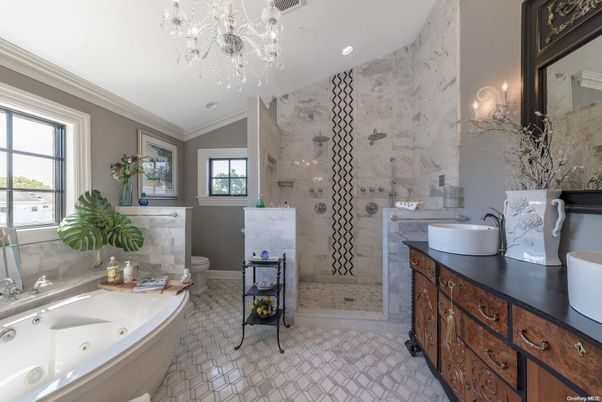 Bathroom, Dual Sink Vanities, Glass Shower, Interior, Marble Walls, Recessed Lighting