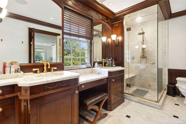 Bathroom, Dual Sink Vanities, Glass Shower, Interior, Marble, Marble Walls, Recessed Lighting
