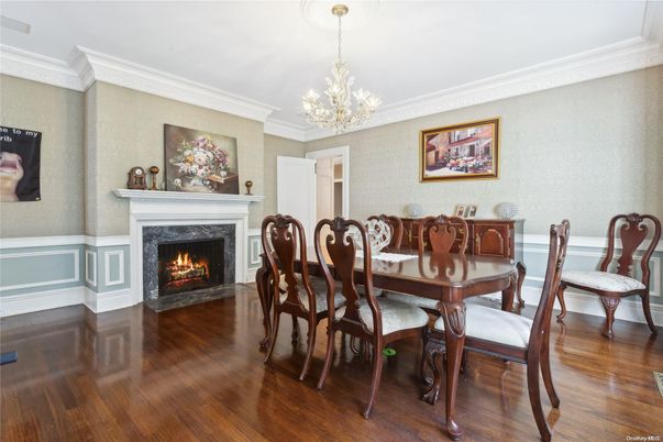 Chandelier, Dining room, Fireplace, Interior, Wood Texture Flooring