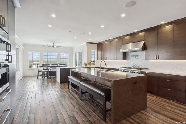 Dining room, Interior, Kitchen, Recessed Lighting, Stainless Steel Appliances, Wood Texture Flooring