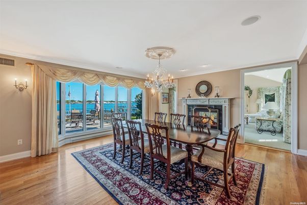 Chandelier, Dining room, Fireplace, Interior, Water, Wood Texture Flooring