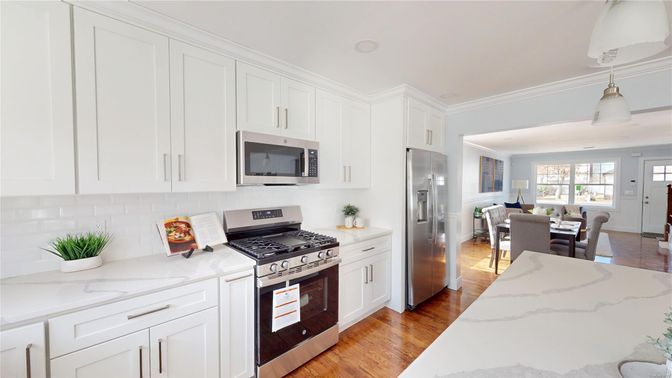 Dining room, Interior, Kitchen, Pendant Lights, Stainless Steel Appliances, Wood Texture Flooring