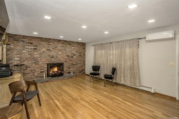 Fireplace, Interior, Recessed Lighting, Stone Walls, Wood Texture Flooring