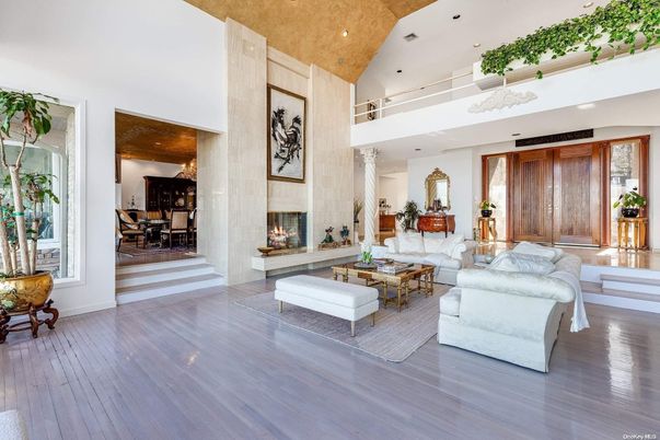 Dining room, Fireplace, Interior, Living room, Recessed Lighting, Wood Texture Flooring
