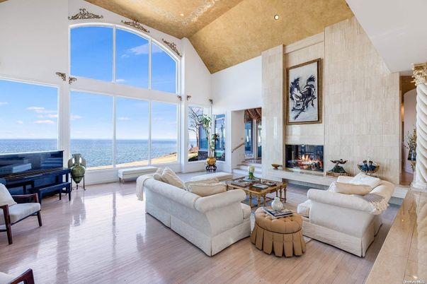 Fireplace, Interior, Living room, Piano, Recessed Lighting, Water, Wood Texture Flooring