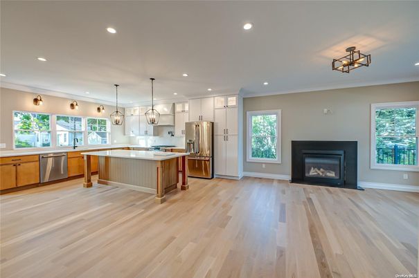 Fireplace, Interior, Kitchen, Pendant Lights, Recessed Lighting, Stainless Steel Appliances, Wood Texture Flooring