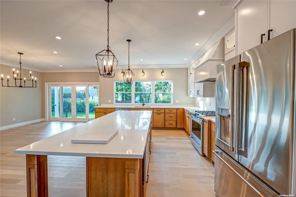 Chandelier, Interior, Kitchen, Pendant Lights, Recessed Lighting, Stainless Steel Appliances, Wood Texture Flooring