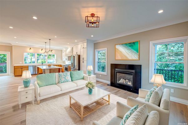 Dining room, Fireplace, Interior, Kitchen, Living room, Pendant Lights, Recessed Lighting, Stainless Steel Appliances, Wood Texture Flooring