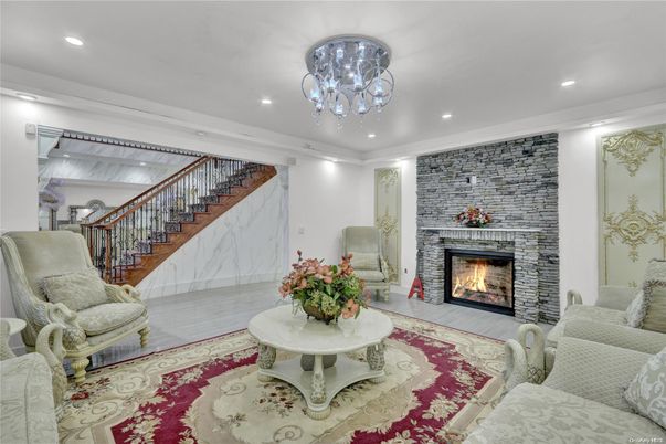 Fireplace, Interior, Living room, Marble Walls, Recessed Lighting, Stone Walls