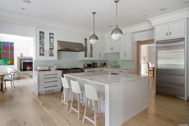 Fireplace, Interior, Kitchen, Living room, Pendant Lights, Recessed Lighting, Stainless Steel Appliances, Wood Texture Flooring