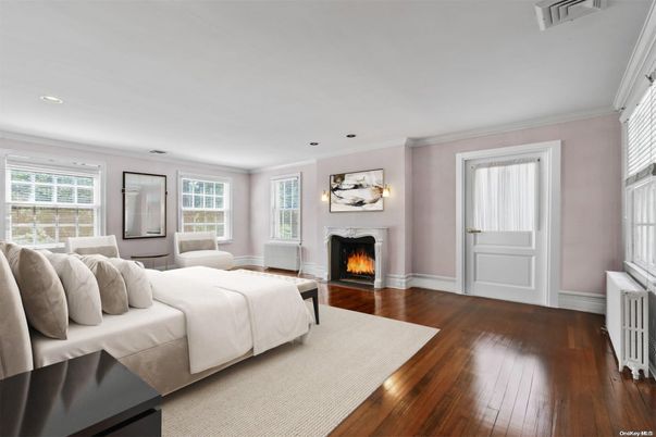 Bedroom, Fireplace, Interior, Recessed Lighting, Wood Texture Flooring